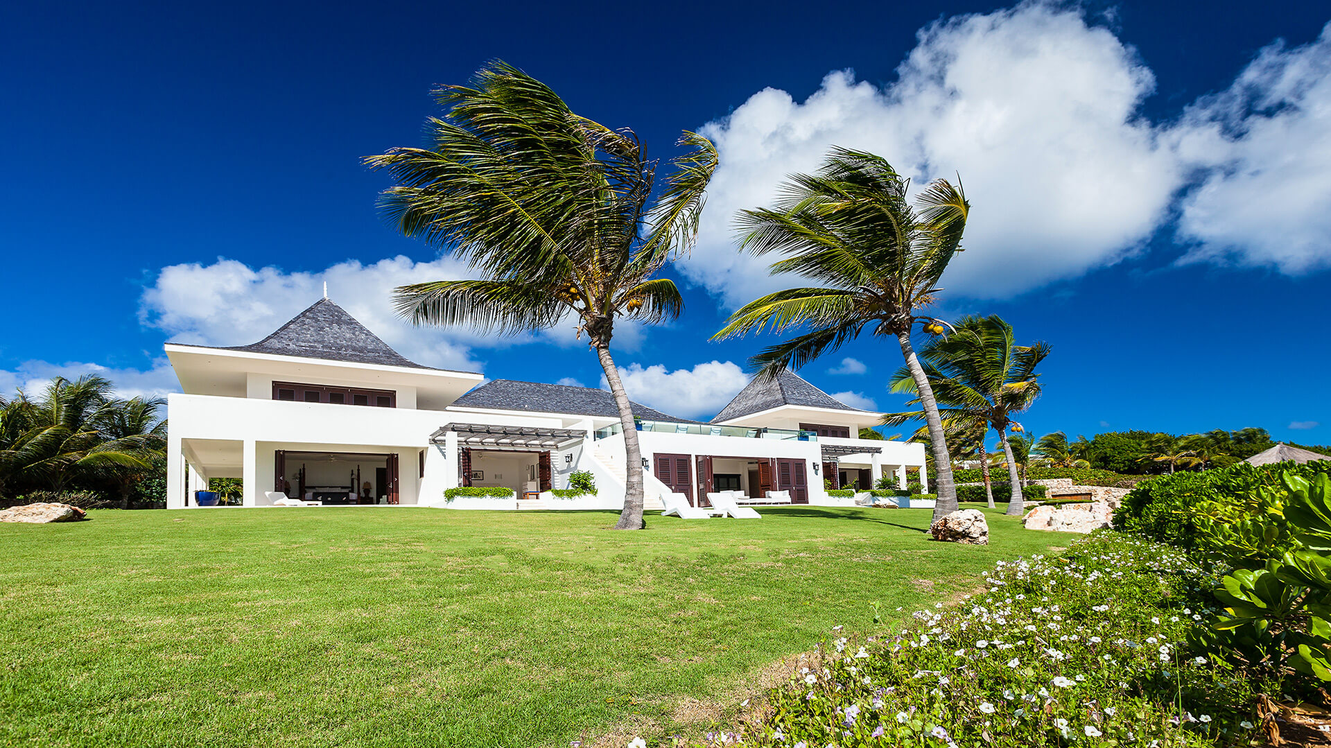 Lush gardens, beach views and gentle island breezes are all yours when you book Le Bleu Villa on Anguilla.
