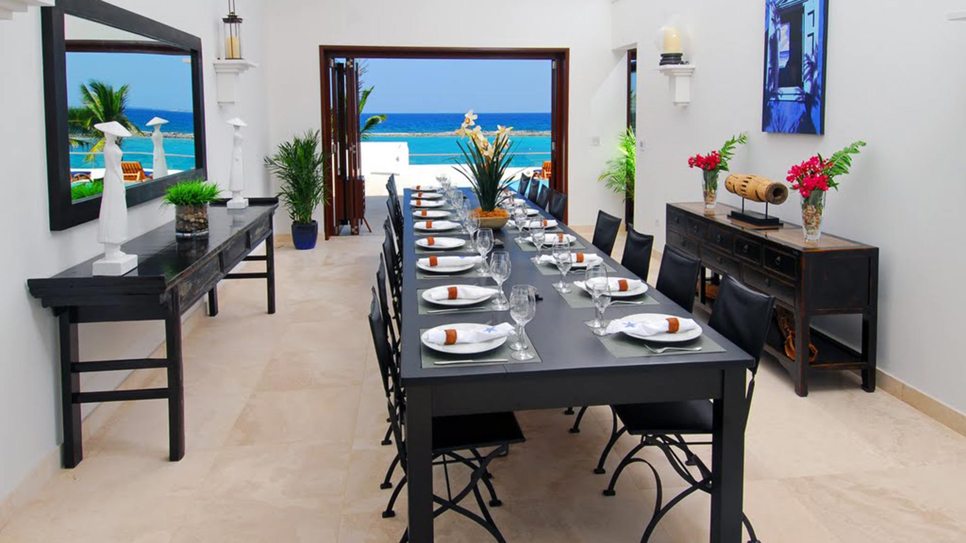 Both elegant indoor dining and casual outdoor dining areas are offered at this stunning luxury Anguilla villa rental.
