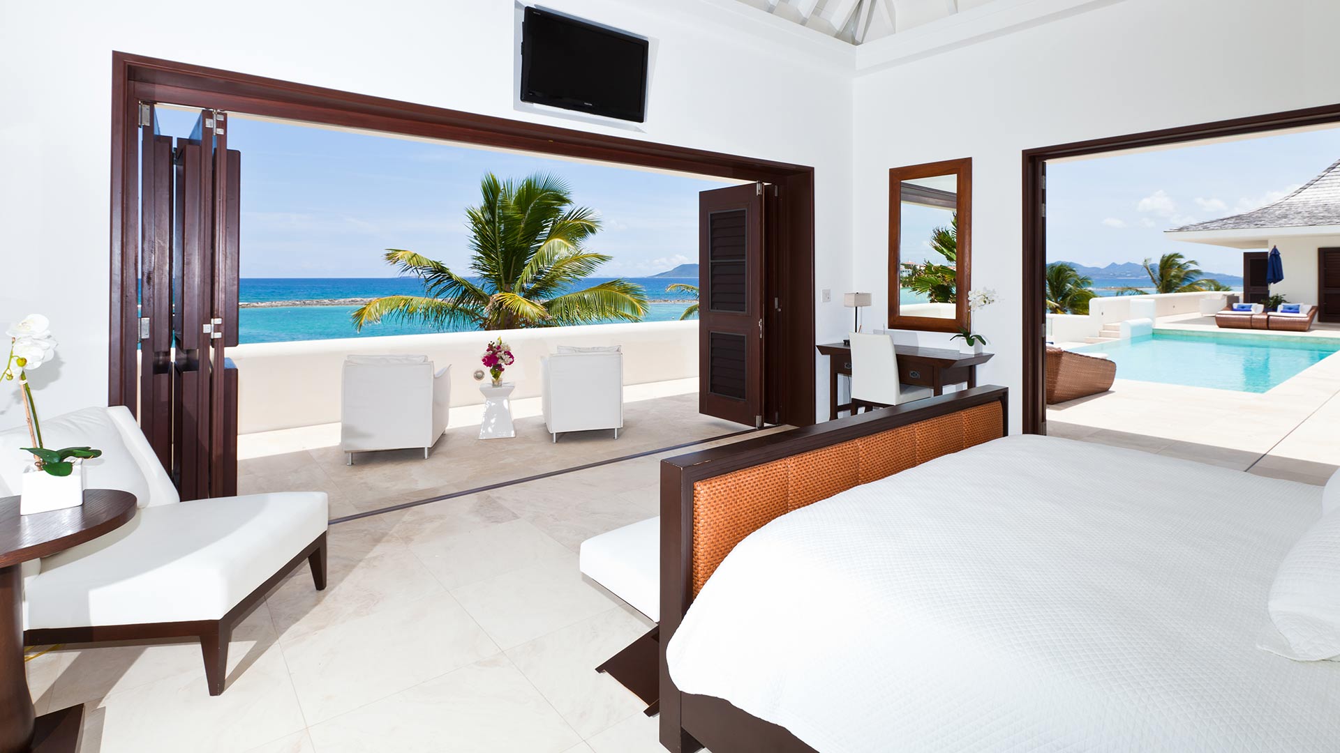 Step from the bed to the island breezes — Le Bleu Villa’s master suites open up to the natural beauty of Anguilla and delight the soul.
