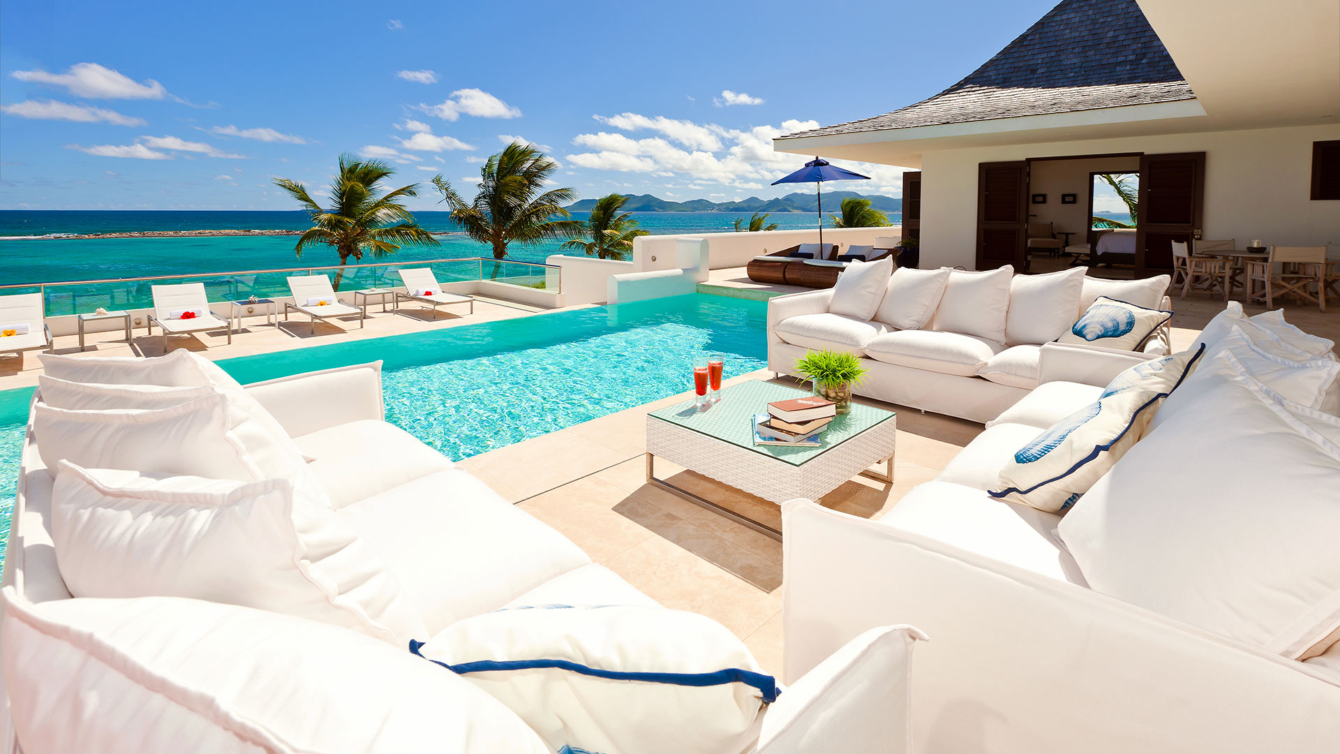 Plush furnishings, even by the pool, allow guest to experience ultimate relaxation and rejuvenation at Le Bleu Villa on Anguilla.
